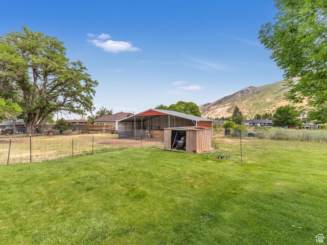 160 N 300 E, Santaquin, UT 84655 - view of yard featuring a mountain view, an outbuilding, and a pole building