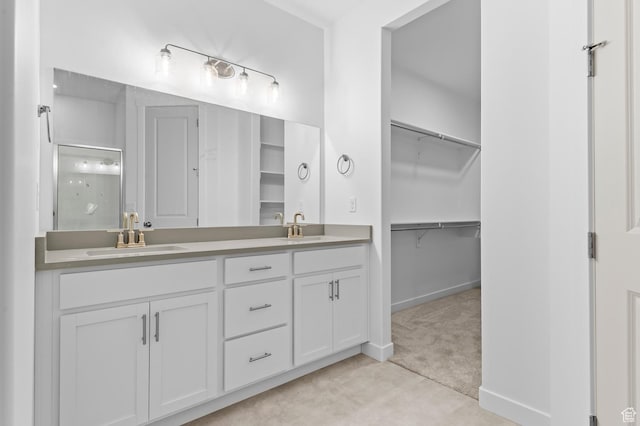 1881 E Moho Mtn, Eagle Mountain, UT 84005 - full bathroom with a stall shower, double vanity, and a spacious closet