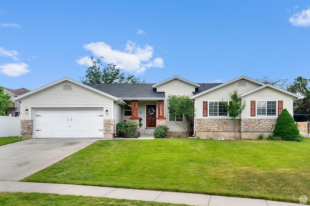 9152 S Crystal Vista Ln, West Jordan, UT 84088 - view of front of house featuring stone siding, a garage, and concrete driveway