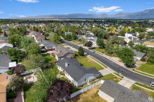 9152 S Crystal Vista Ln, West Jordan, UT 84088 - aerial view of property's location with nearby suburban area and a mountain backdrop
