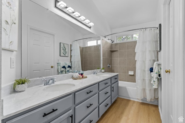9152 S Crystal Vista Ln, West Jordan, UT 84088 - bathroom featuring shower / tub combo with curtain, double vanity, and wood finished floors