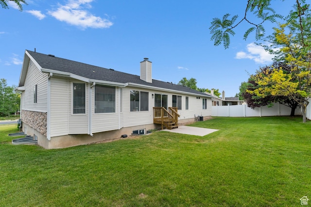9152 S Crystal Vista Ln, West Jordan, UT 84088 - rear view of house with a chimney and a patio area