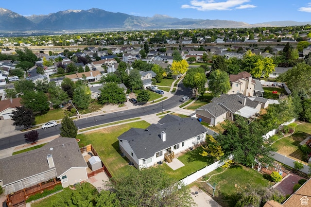9152 S Crystal Vista Ln, West Jordan, UT 84088 - aerial view of property's location with nearby suburban area and a mountain backdrop