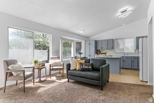 9152 S Crystal Vista Ln, West Jordan, UT 84088 - living room with light carpet and vaulted ceiling