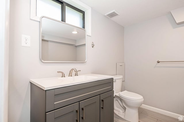 1344 E 23rd St N, Ogden, UT 84401 - half bathroom with vanity and wood finished floors