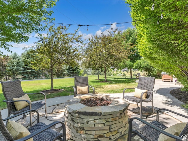 6037 Chamberry Way N, Highland, UT 84003 - view of patio / terrace featuring an outdoor fire pit and view of wooded area