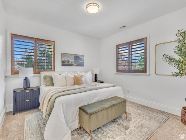 6037 Chamberry Way N, Highland, UT 84003 - bedroom with multiple windows and light carpet