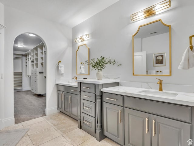 6037 Chamberry Way N, Highland, UT 84003 - full bathroom with vanity, a spacious closet, and tile patterned flooring