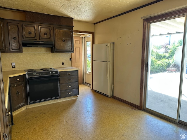 250 E Beryl, South Salt Lake, UT 84115 - kitchen with freestanding refrigerator, electric range, under cabinet range hood, dark brown cabinets, and light countertops