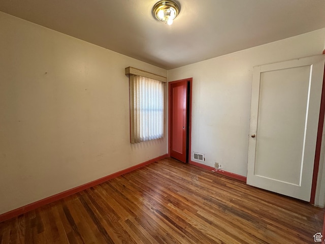 250 E Beryl, South Salt Lake, UT 84115 - unfurnished room featuring wood finished floors and baseboards
