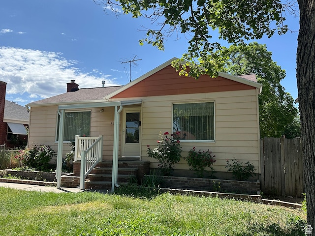250 E Beryl, South Salt Lake, UT 84115 - bungalow-style house featuring a chimney