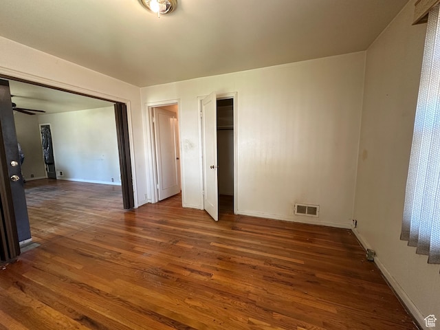 250 E Beryl, South Salt Lake, UT 84115 - unfurnished bedroom with wood finished floors and two closets
