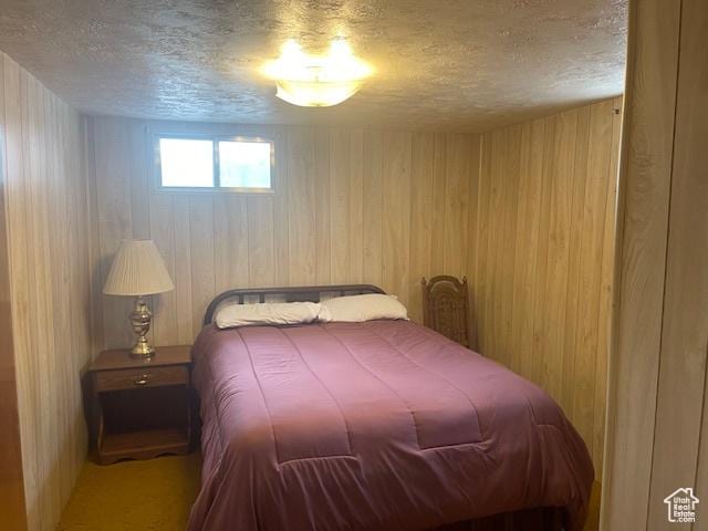 535 W 500 N, Malad City, ID 83252 - bedroom featuring a textured ceiling and wood walls