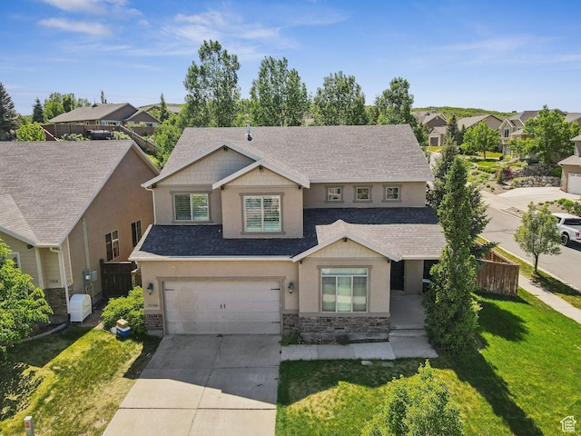 15106 S Heather Stone Cir, Draper, UT 84020 - view of front of property with stone siding, stucco siding, concrete driveway, and a garage