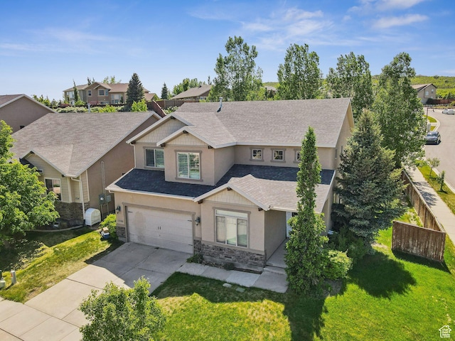 15106 S Heather Stone Cir, Draper, UT 84020 - craftsman house featuring stucco siding, stone siding, driveway, roof with shingles, and a garage