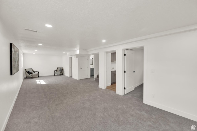 1003 E Platinum Way, Sandy, UT 84094 - finished basement with carpet flooring and recessed lighting