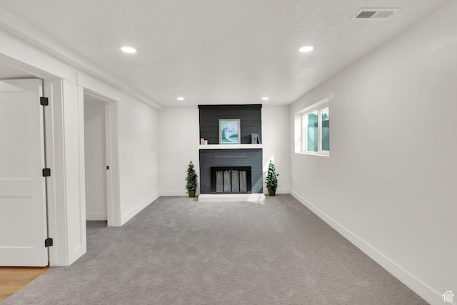 1003 E Platinum Way, Sandy, UT 84094 - unfurnished living room with a fireplace, recessed lighting, and carpet