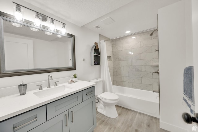 1003 E Platinum Way, Sandy, UT 84094 - full bathroom with vanity, wood finished floors, shower / bathtub combination with curtain, and a textured ceiling