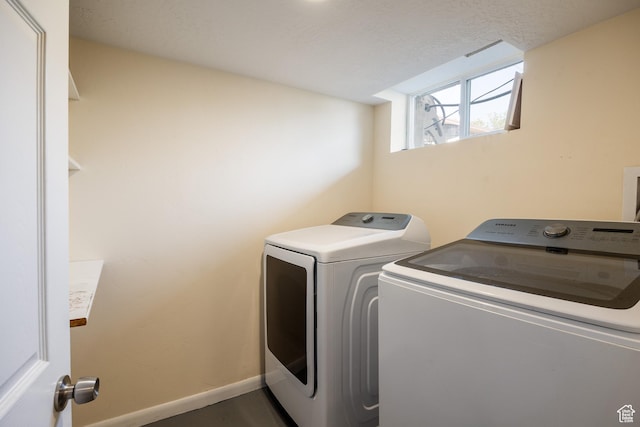 1523 E 3115 S, Millcreek, UT 84106 - washroom featuring separate washer and dryer and baseboards