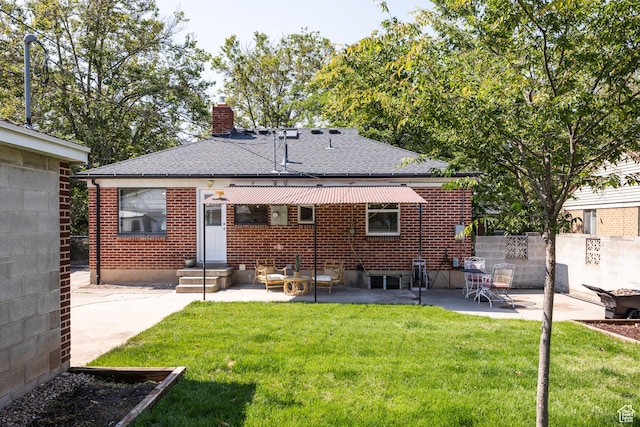 1523 E 3115 S, Millcreek, UT 84106 - back of property with a patio, a chimney, brick siding, and a shingled roof