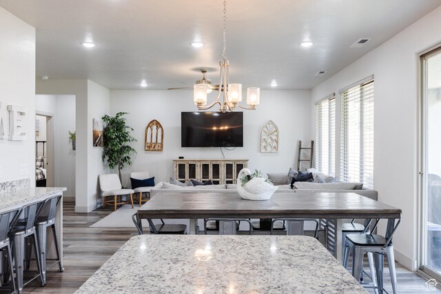 344 N Puerta Dr, Washington, UT 84780 - dining area featuring dark wood-style floors, recessed lighting, and a chandelier
