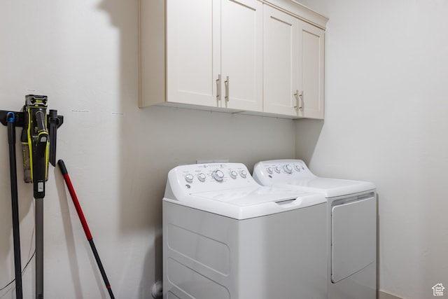 344 N Puerta Dr, Washington, UT 84780 - laundry room with cabinet space and washer and clothes dryer