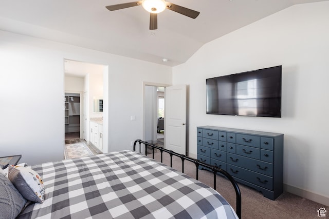 344 N Puerta Dr, Washington, UT 84780 - bedroom with vaulted ceiling, light colored carpet, a ceiling fan, and connected bathroom
