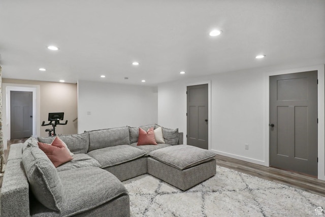 448 Lourdes Ln, Stansbury Park, UT 84074 - living room featuring wood finished floors and recessed lighting