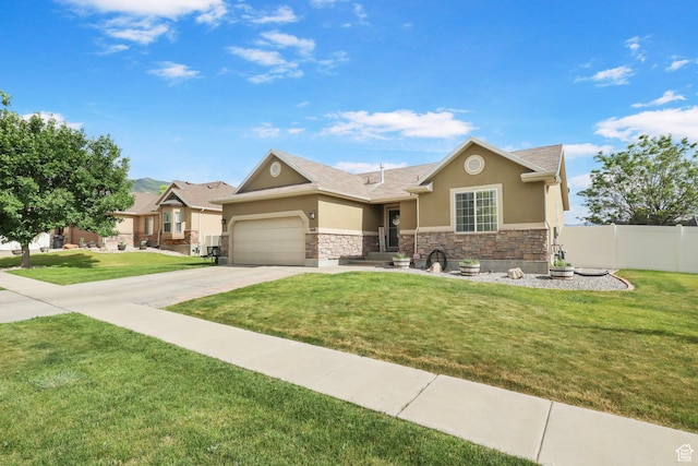 448 Lourdes Ln, Stansbury Park, UT 84074 - view of front of property featuring stucco siding, stone siding, a garage, and driveway