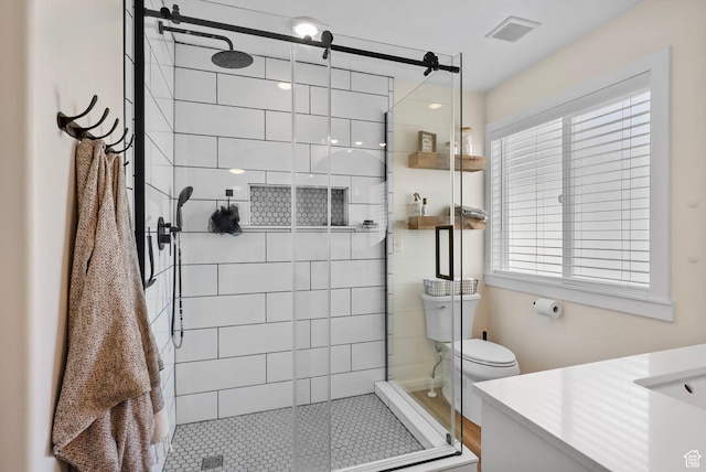 448 Lourdes Ln, Stansbury Park, UT 84074 - full bath featuring vanity, a stall shower, plenty of natural light, and tile patterned flooring