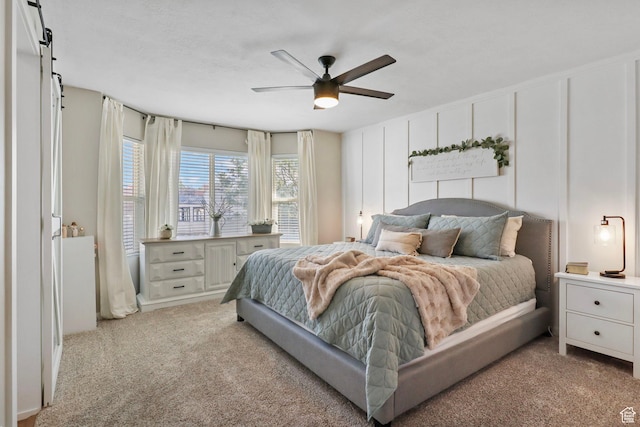 448 Lourdes Ln, Stansbury Park, UT 84074 - bedroom featuring light carpet and a ceiling fan