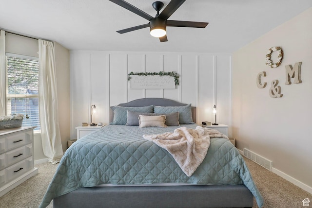 448 Lourdes Ln, Stansbury Park, UT 84074 - bedroom featuring light carpet and a ceiling fan