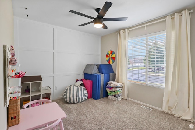448 Lourdes Ln, Stansbury Park, UT 84074 - game room featuring ceiling fan, carpet, and a decorative wall