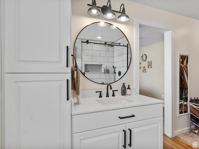 448 Lourdes Ln, Stansbury Park, UT 84074 - full bath with vanity, a shower, and wood finished floors