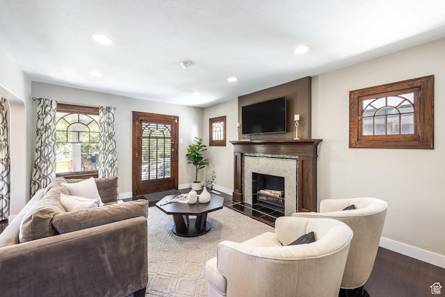 1603 S 1600 E, Salt Lake City, UT 84105 - living area with a tiled fireplace, recessed lighting, and wood finished floors