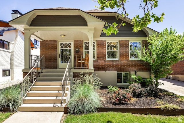 1603 S 1600 E, Salt Lake City, UT 84105 - view of front facade with brick siding and a porch