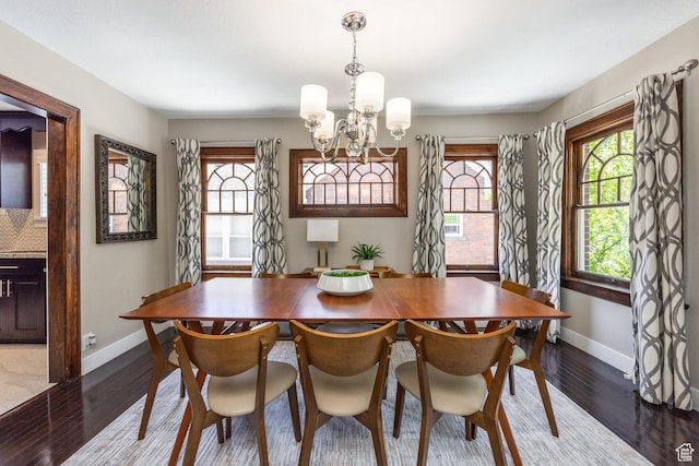 1603 S 1600 E, Salt Lake City, UT 84105 - dining space featuring healthy amount of natural light, dark wood-type flooring, and a chandelier