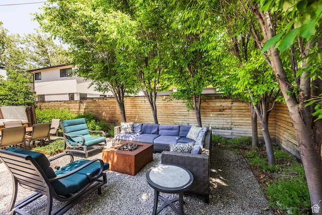1603 S 1600 E, Salt Lake City, UT 84105 - fenced backyard with an outdoor living space with a fire pit and a patio area