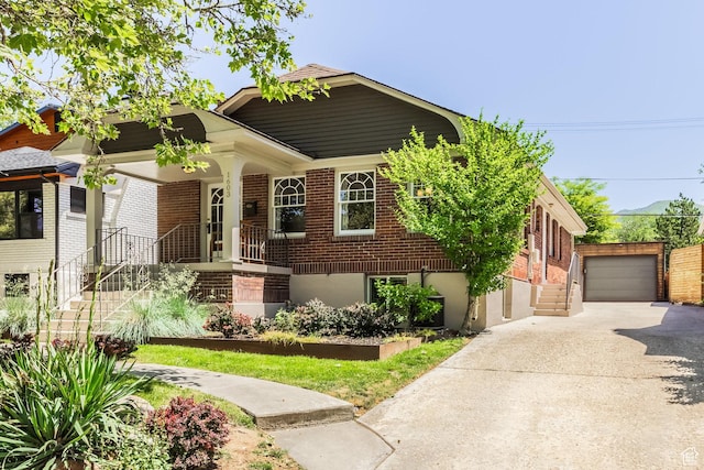 1603 S 1600 E, Salt Lake City, UT 84105 - view of front of house featuring brick siding and an outbuilding