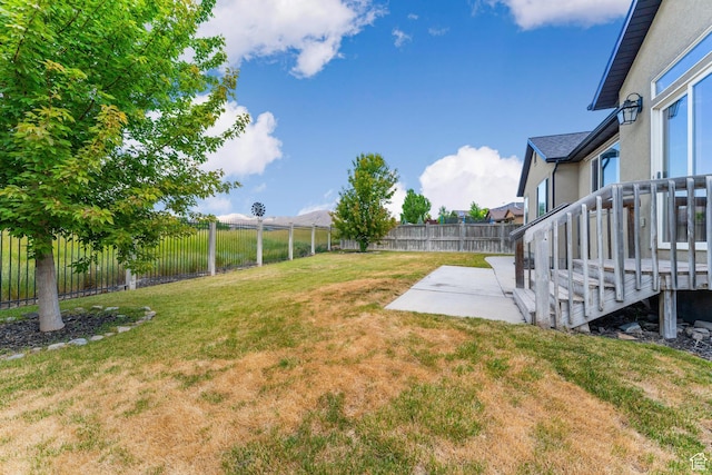 8743 N Franklin Dr E, Eagle Mountain, UT 84005 - fenced backyard featuring a patio