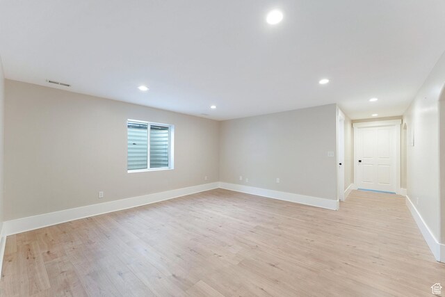 8743 N Franklin Dr E, Eagle Mountain, UT 84005 - unfurnished room featuring light wood-style flooring and recessed lighting