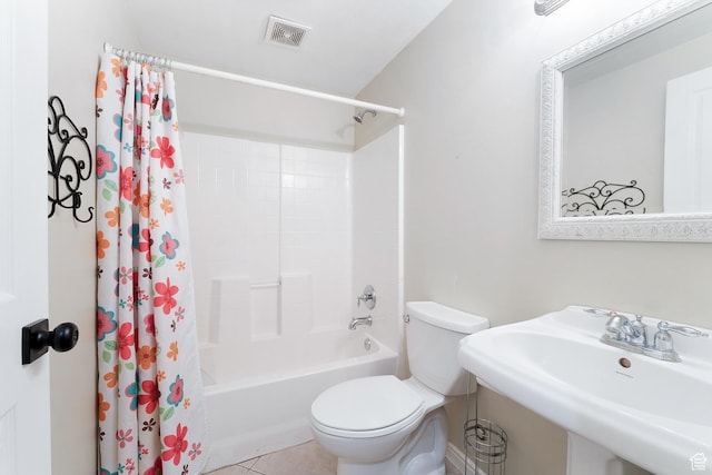 8743 N Franklin Dr E, Eagle Mountain, UT 84005 - bathroom featuring shower / bathtub combination with curtain and tile patterned floors