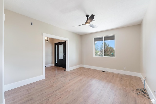 8743 N Franklin Dr E, Eagle Mountain, UT 84005 - empty room featuring light wood-style flooring and ceiling fan