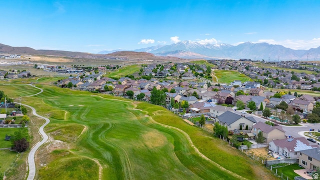 8743 N Franklin Dr E, Eagle Mountain, UT 84005 - aerial view of property and surrounding area with nearby suburban area, mountains, and a golf course