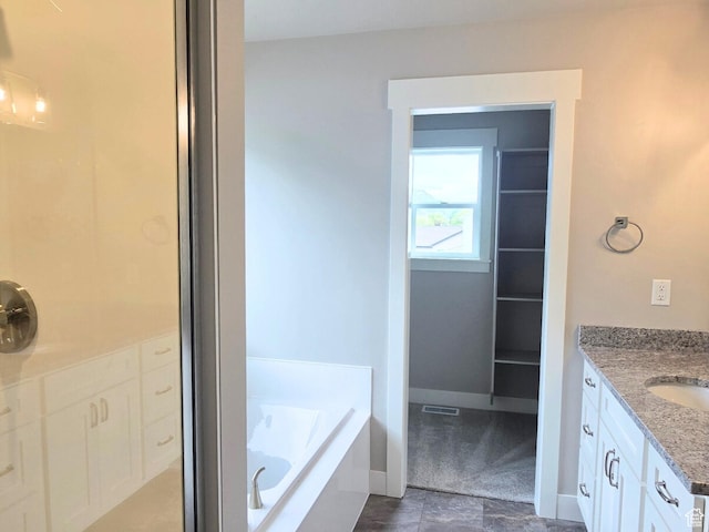 442 W 1325 N Unit 25, Brigham City, UT 84302 - full bathroom featuring vanity, a bath, and a shower