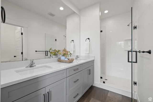 11079 S Lake Run Rd, South Jordan, UT 84009 - full bath featuring double vanity, a shower stall, and recessed lighting