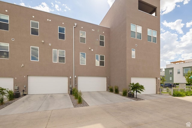 11079 S Lake Run Rd, South Jordan, UT 84009 - view of property featuring a garage and concrete driveway