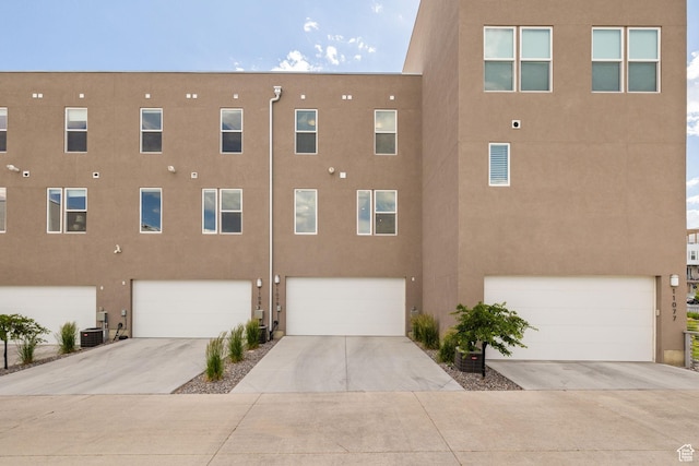 11079 S Lake Run Rd, South Jordan, UT 84009 - view of building exterior with a garage and driveway