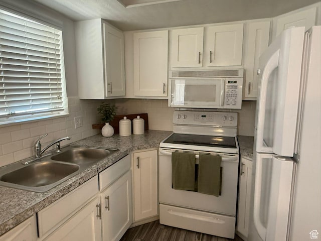 5509 S 2150 W, Roy, UT 84067 - kitchen featuring white appliances, backsplash, white cabinetry, and light countertops