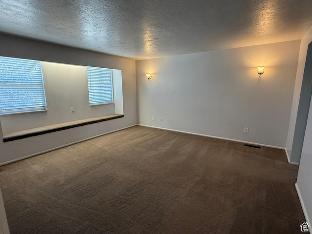 5509 S 2150 W, Roy, UT 84067 - unfurnished room with a textured ceiling, carpet flooring, and healthy amount of natural light